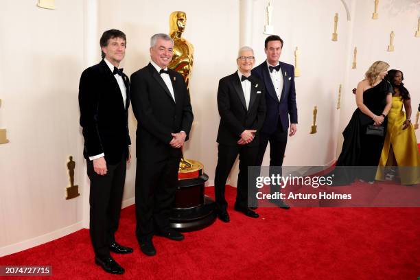 Jamie Erlicht, Eddy Cue, Tim Cook and Zack Van Amburg attend the 96th Annual Academy Awards on March 10, 2024 in Hollywood, California.