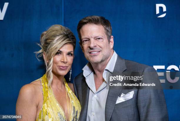 Television personality Alexis Bellino and John Janssen attend the DIRECTV Streaming With The Stars Hosted by Rob Lowe event at Spago on March 10,...