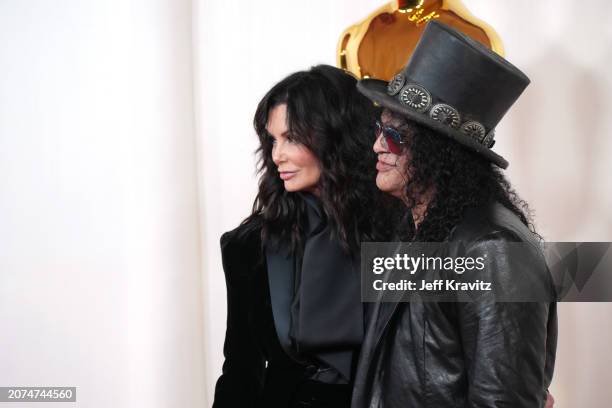 Meegan Hodges and Slash attend the 96th Annual Academy Awards on March 10, 2024 in Hollywood, California.