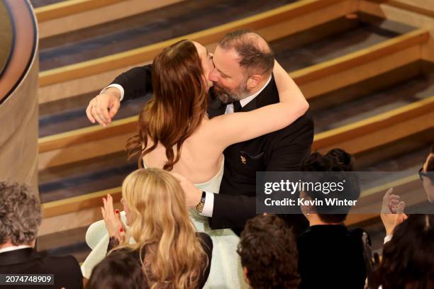 Emma Stone and Yorgos Lanthimos are seen onstage during the 96th Annual Academy Awards at Dolby Theatre on March 10, 2024 in Hollywood, California.