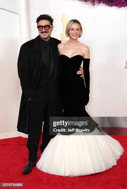 Marcus Mumford and Carey Mulligan attend the 96th Annual Academy Awards at Dolby Theatre on March 10, 2024 in Hollywood, California.