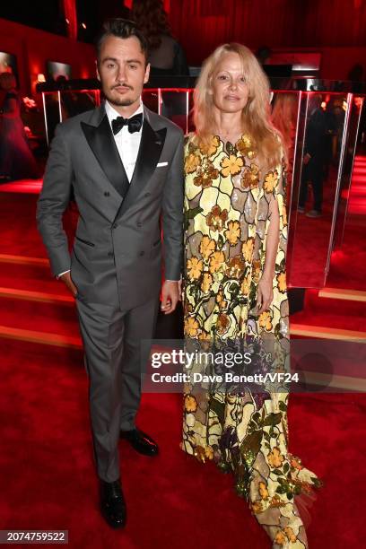 Brandon Thomas Lee and Pamela Anderson attend the 2024 Vanity Fair Oscar Party Hosted By Radhika Jones at Wallis Annenberg Center for the Performing...