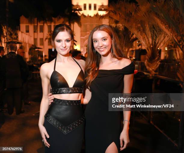 Louisa Jacobson and Nicole Brydon Bloom attend the 2024 Vanity Fair Oscar Party Hosted By Radhika Jones at Wallis Annenberg Center for the Performing...