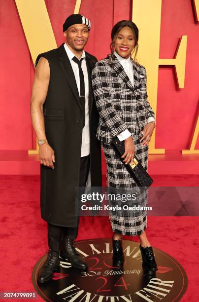Russell Westbrook and Nina Westbrook attend the 2024 Vanity Fair Oscar Party Hosted By Radhika Jones at Wallis Annenberg Center for the Performing...