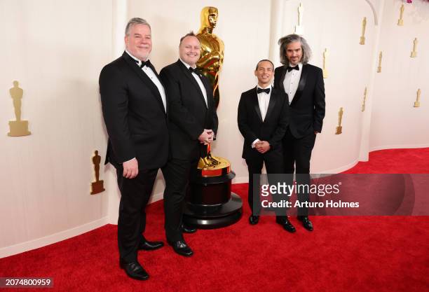 Guy Williams, Stephane Ceretti, Theo Bialek and Alexis Wajsbrot attend the 96th Annual Academy Awards on March 10, 2024 in Hollywood, California.