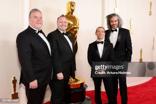 Guy Williams, Stephane Ceretti, Theo Bialek and Alexis Wajsbrot attend the 96th Annual Academy Awards on March 10, 2024 in Hollywood, California.