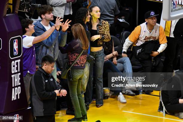 Lily-Rose Depp and musician 070 Shake attend a basketball game between the Los Angeles Lakers and the Minnesota Timberwolves at Crypto.com Arena on...