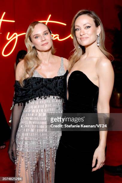 Diane Kruger and Olivia Wilde attend the 2024 Vanity Fair Oscar Party Hosted By Radhika Jones at Wallis Annenberg Center for the Performing Arts on...