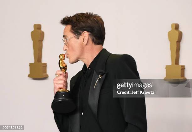 Robert Downey Jr., winner of the Best Actor in a Supporting Role award for “Oppenheimer”, pose in the press room during the 96th Annual Academy...