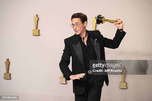 Robert Downey Jr., winner of the Best Actor in a Supporting Role award for “Oppenheimer”, pose in the press room during the 96th Annual Academy...