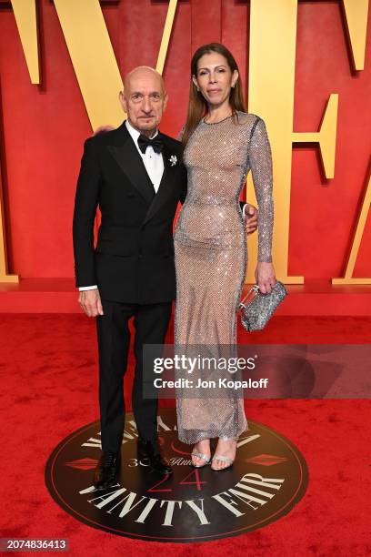 Ben Kingsley and Daniela Lavender attend the 2024 Vanity Fair Oscar Party Hosted By Radhika Jones at Wallis Annenberg Center for the Performing Arts...