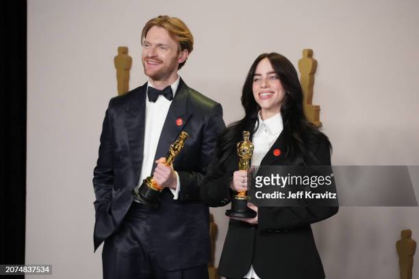 Finneas O'Connell and Billie Eilish, winners of the Best Original Song award for 'What Was I Made For?' from "Barbie", pose in the press room during...