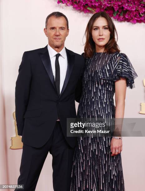 John Battsek and Sarah Thompson attend the 96th Annual Academy Awards on March 10, 2024 in Hollywood, California.