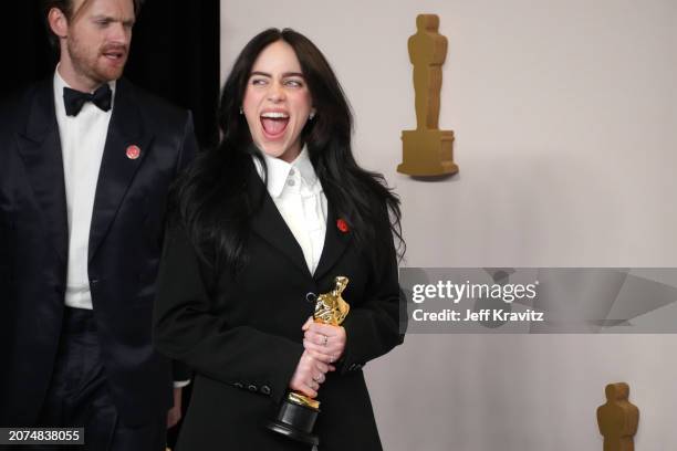 Finneas O'Connell and Billie Eilish, winners of the Best Original Song award for 'What Was I Made For?' from "Barbie", pose in the press room during...