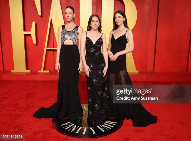 Este Haim, Alana Haim, and Danielle Haim of HAIM attend the 2024 Vanity Fair Oscar Party Hosted By Radhika Jones at Wallis Annenberg Center for the...