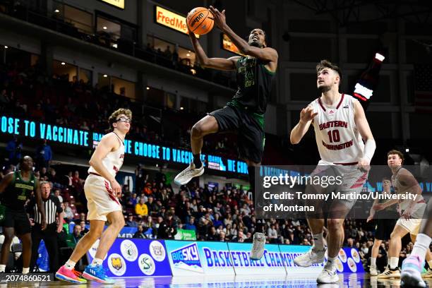 Zee Hamoda of the Sacramento State Hornets shoots a layup over Ethan Price of the Eastern Washington Eagles during the second half at Idaho Central...