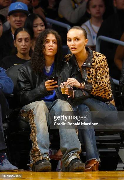 Shake and Lily-Rose Depp attend a game between the Minnesota Timberwolves and the Los Angeles Lakers at Crypto.com Arena on March 10, 2024 in Los...