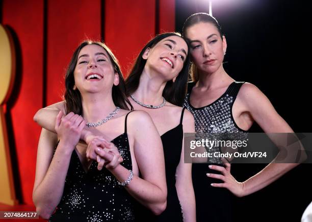 Este Haim, Alana Haim, and Danielle Haim attend the 2024 Vanity Fair Oscar Party Hosted By Radhika Jones at Wallis Annenberg Center for the...