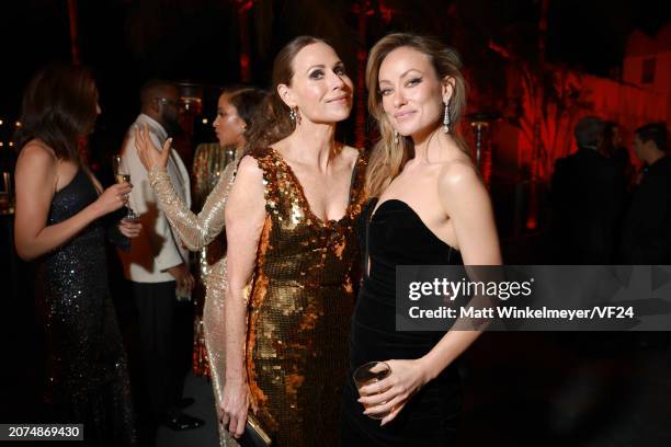 Minnie Driver and Olivia Wilde attend the 2024 Vanity Fair Oscar Party Hosted By Radhika Jones at Wallis Annenberg Center for the Performing Arts on...