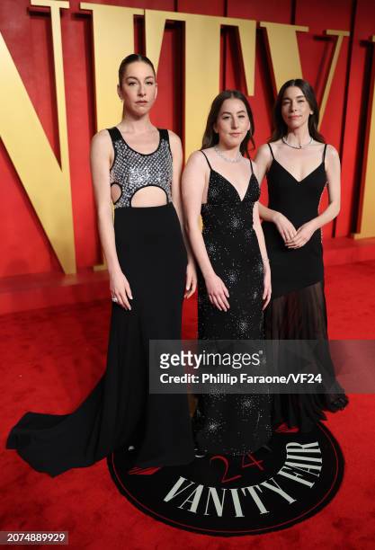 Este Haim, Alana Haim and Danielle Haim attend the 2024 Vanity Fair Oscar Party Hosted By Radhika Jones at Wallis Annenberg Center for the Performing...