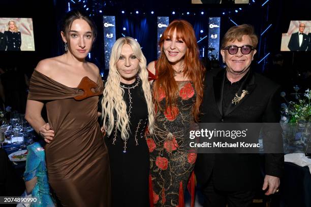Bella Broekman-Tilbury, Donatella Versace, Charlotte Tilbury, and Elton John attend the Elton John AIDS Foundation's 32nd Annual Academy Awards...