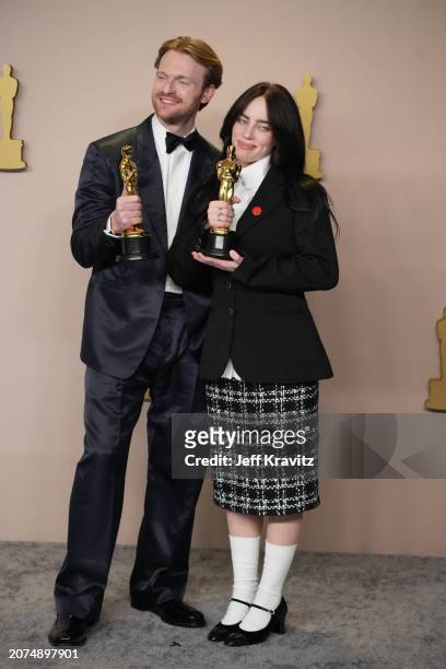 Finneas O'Connell and Billie Eilish onstage in the press room at the 96th Annual Academy Awards at Ovation Hollywood on March 10, 2024 in Hollywood,...