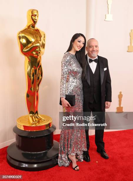 Clara Wong and Paul Giamatti attend the 96th Annual Academy Awards on March 10, 2024 in Hollywood, California.