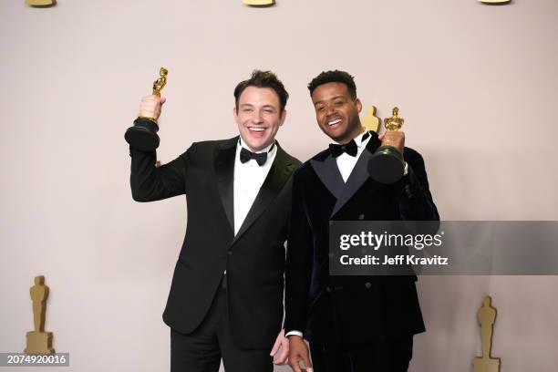 Ben Proudfoot and Kris Bowers, winners of the Best Documentary Short Film award for “The Last Repair Shop”, onstage in the press room at the 96th...