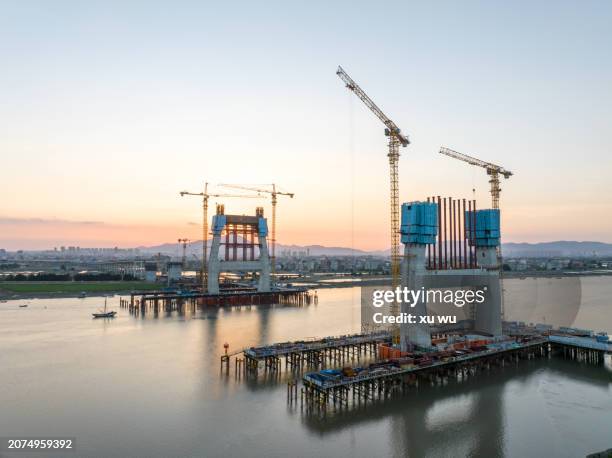 cross-river bridge construction site - motorway roadworks stock pictures, royalty-free photos & images