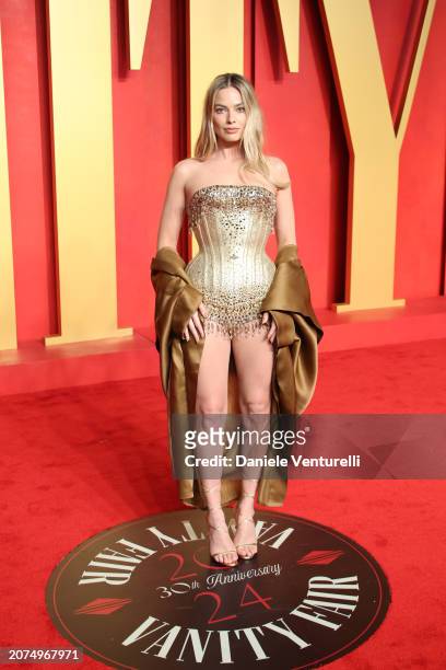 Margot Robbie attends the 2024 Vanity Fair Oscar Party Hosted By Radhika Jones at Wallis Annenberg Center for the Performing Arts on March 10, 2024...
