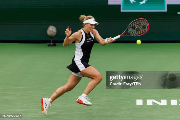 Angelique Kerber of Germany hits a forehand against Veronika Kudermetova of Russia in the third round of the BNP Paribas Masters at Indian Wells...