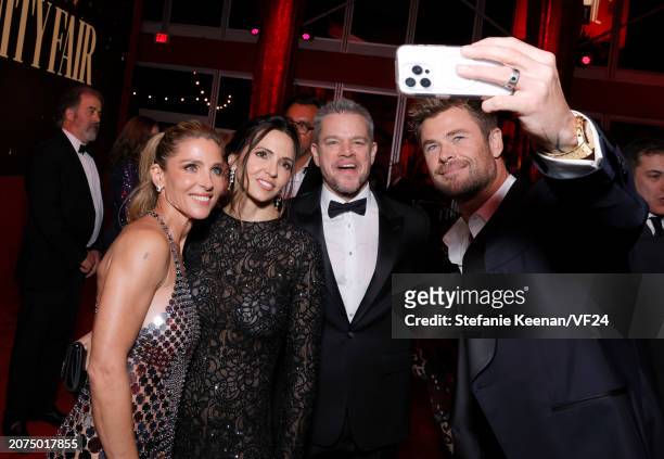 Elsa Pataky, Luciana Damon, Matt Damon, and Chris Hemsworth attend the 2024 Vanity Fair Oscar Party Hosted By Radhika Jones at Wallis Annenberg...