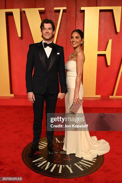 John Mulaney and Olivia Munn attend the 2024 Vanity Fair Oscar Party Hosted By Radhika Jones at Wallis Annenberg Center for the Performing Arts on...