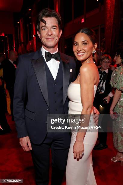 John Mulaney and Olivia Munn attend the 2024 Vanity Fair Oscar Party Hosted By Radhika Jones at Wallis Annenberg Center for the Performing Arts on...