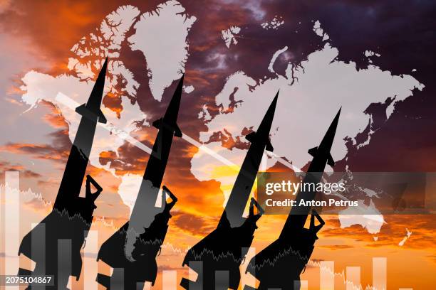 missiles on the background of a world map. world war - shelling stock pictures, royalty-free photos & images