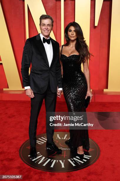 Patrick Whitesell and Pia Miller attend the 2024 Vanity Fair Oscar Party Hosted By Radhika Jones at Wallis Annenberg Center for the Performing Arts...