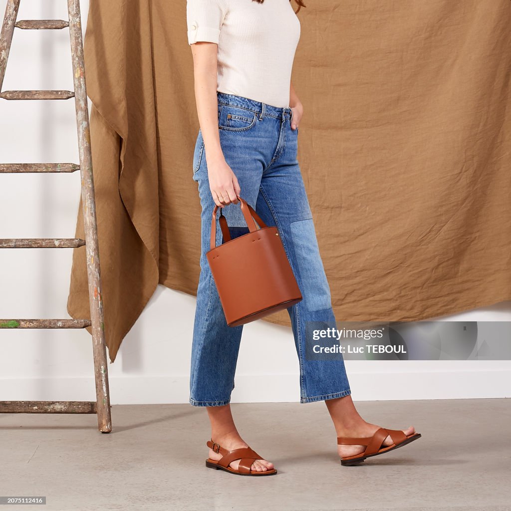 Brown leather bag and sandals