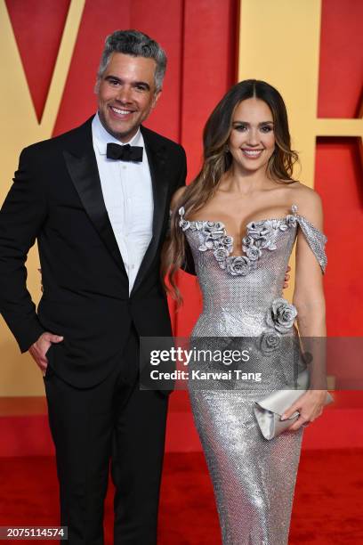 Cash Warren and Jessica Alba attend the 2024 Vanity Fair Oscar Party hosted by Radhika Jones at Wallis Annenberg Center for the Performing Arts on...