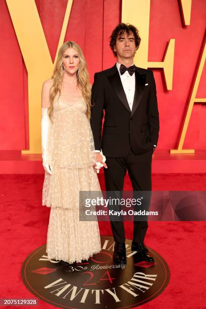 Lily Rabe and Hamish Linklater attend the 2024 Vanity Fair Oscar Party Hosted By Radhika Jones at Wallis Annenberg Center for the Performing Arts on...
