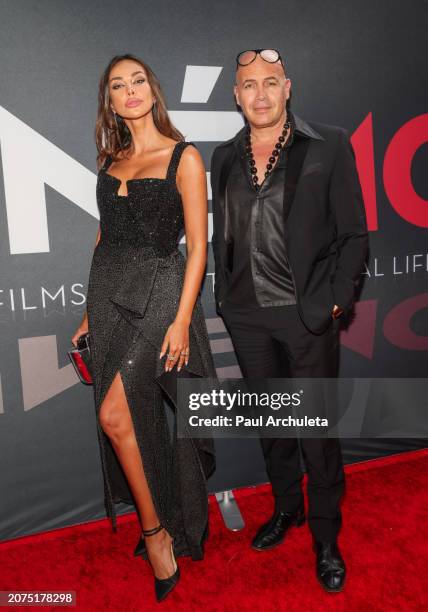 Madalina Ghenea and Billy Zane attend the Justice For Women International and Children Uniting Nations' 24th Annual Academy Awards Celebration at...