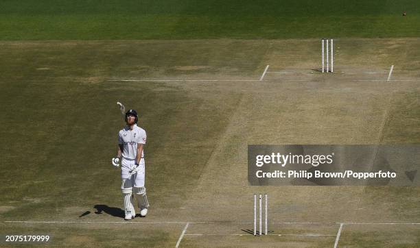 Ben Stokes of England throws his bat in the air after being dismissed by Ravichandran Ashwin during day three of the 5th Test Match between India and...