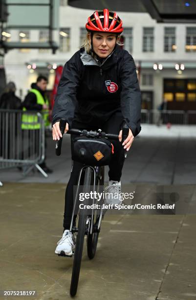 Mollie King as she starts to cycle from London to Hull for Comic relief at Television Centre on March 11, 2024 in London, England.