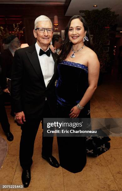 Of Apple Tim Cook and Lily Gladstone attend the Apple Original Films Oscars celebration at the Sunset Tower Hotel on March 10, 2024 in Los Angeles,...