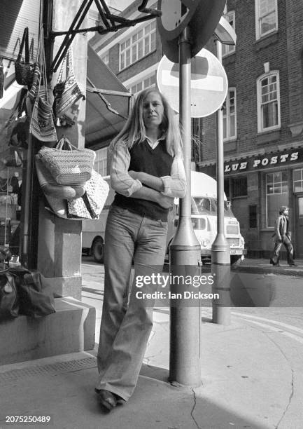 Clifford T Ward, portrait, standing on the corner of Berwick Street and Broadwick street in Soho, London, 1973.