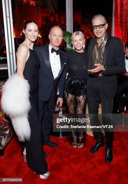 Emilie Livingston, Michael Keaton, Marni Turner, and Jeff Goldblum attend the 2024 Vanity Fair Oscar Party Hosted By Radhika Jones at Wallis...