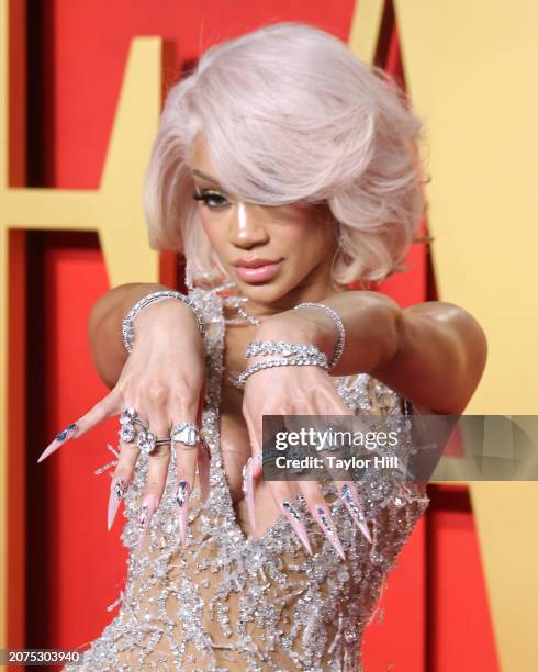 Saweetie attends the 2024 Vanity Fair Oscar Party hosted by Radhika Jones at Wallis Annenberg Center for the Performing Arts on March 10, 2024 in...