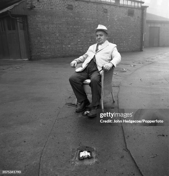 English inventor Percy Shaw seated on a chair in the centre of a road in Halifax, Yorkshire, England in 1966. Percy Shaw is best known as the...