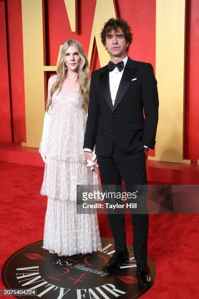 Lily Rabe and Hamish Linklater attend the 2024 Vanity Fair Oscar Party hosted by Radhika Jones at Wallis Annenberg Center for the Performing Arts on...