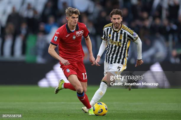 Charles De Ketelaere of Atalanta is pursued by Manuel Locatelli of Juventus during the Serie A TIM match between Juventus and Atalanta BC - Serie A...