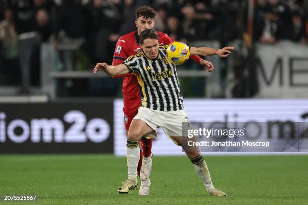 Matteo Ruggieri of Atalanta tussles with Federico Chiesa of Juventus during the Serie A TIM match between Juventus and Atalanta BC - Serie A TIM at...